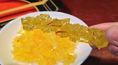 Saffron stick candy